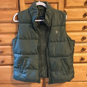 Sleeveless vest. Barely ever worn.